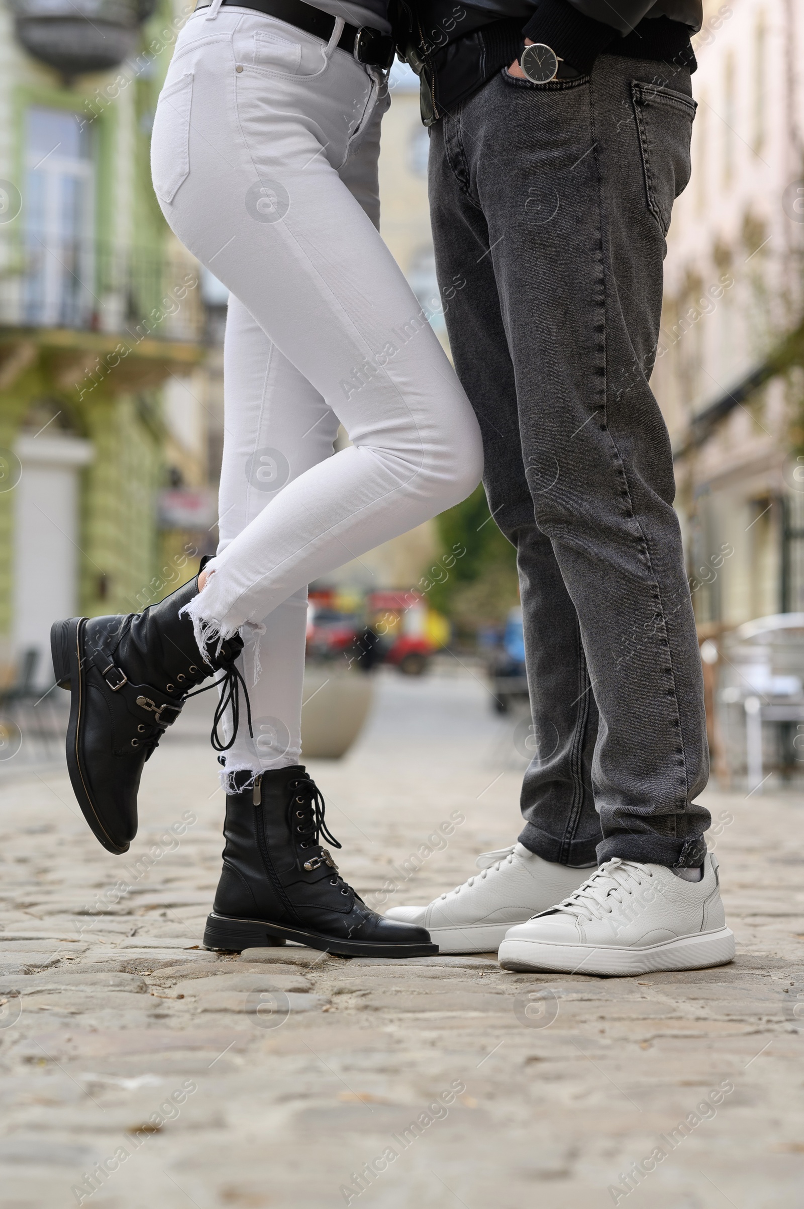 Photo of Lovely couple enjoying time together outdoors, closeup. Romantic date