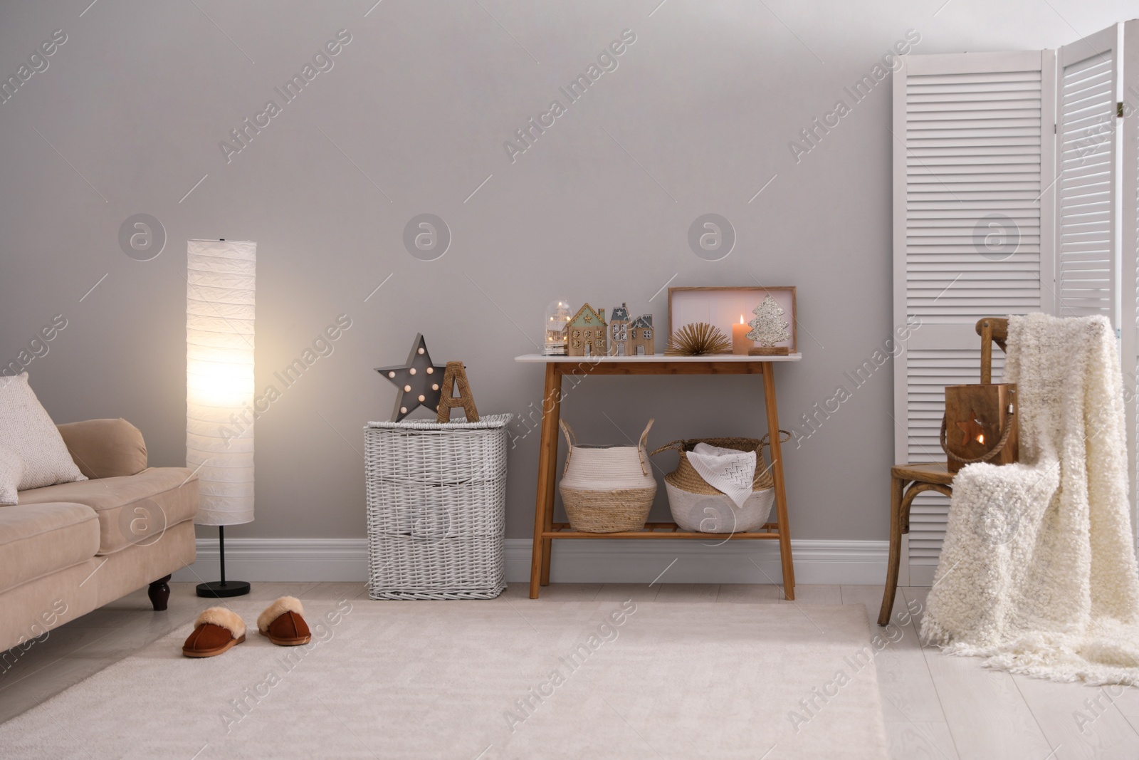 Photo of Modern room interior with table near light wall