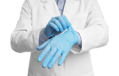 Photo of Doctor wearing light blue medical gloves on white background, closeup