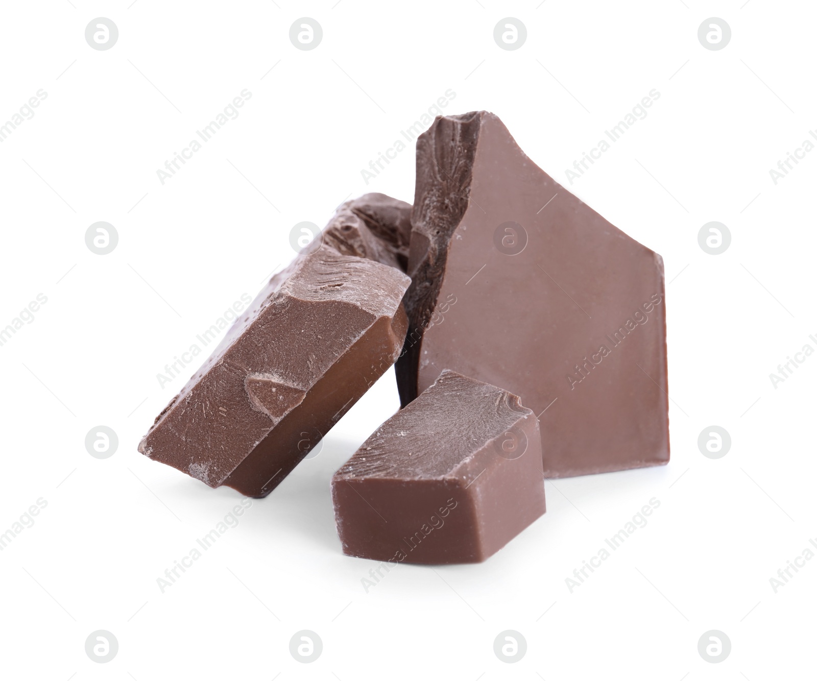 Photo of Pieces of milk chocolate isolated on white