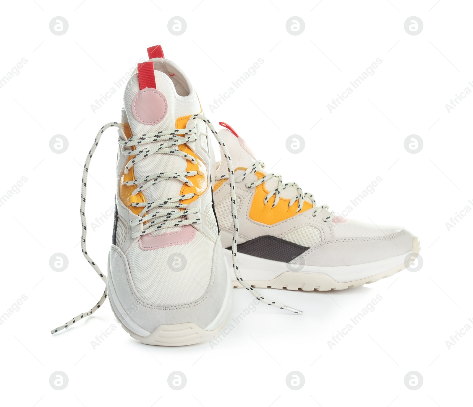 Photo of Pair of stylish sneakers on white background