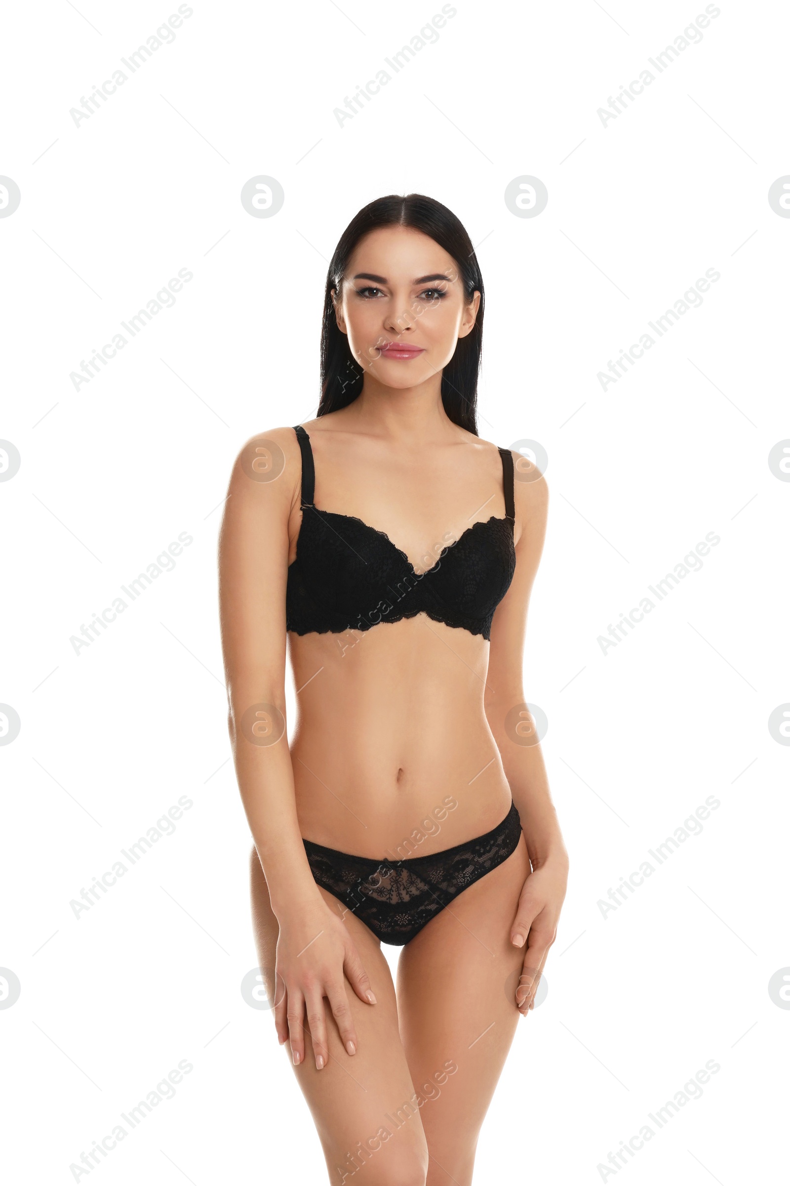 Photo of Beautiful young woman in black underwear isolated on white