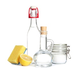 Photo of Composition with vinegar, lemon and baking soda on white background. House cleaning