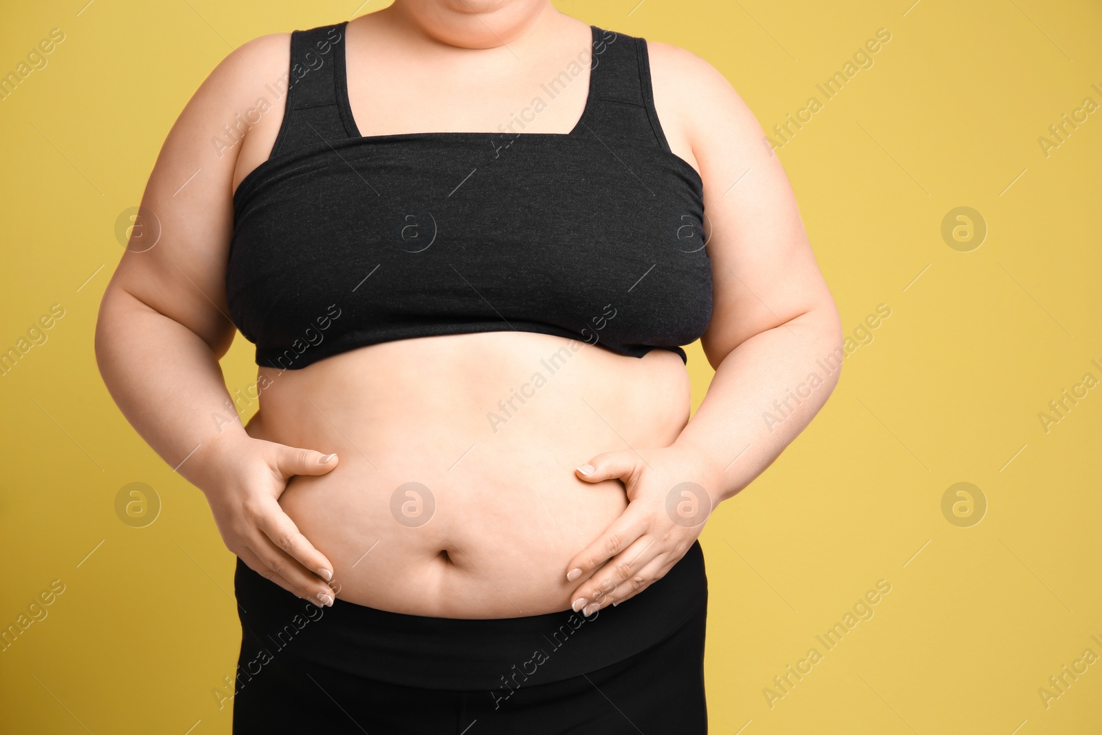 Photo of Overweight woman on color background