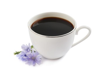 Photo of Cup of delicious chicory drink and flowers on white background