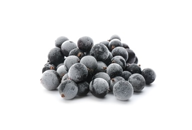 Heap of tasty frozen black currants on white background