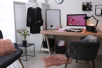 Modern workplace interior with computer on table