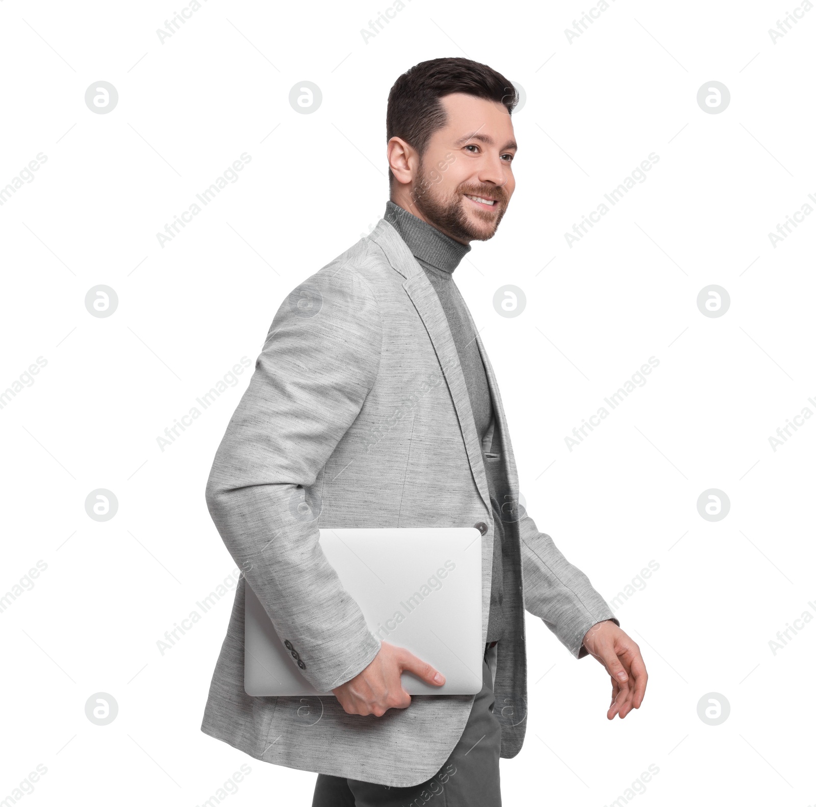 Photo of Handsome bearded businessman with tablet on white background