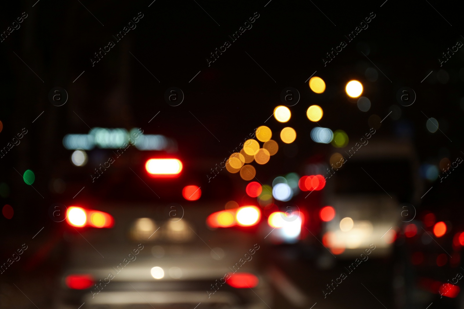 Photo of Blurred view of city at night. Bokeh effect