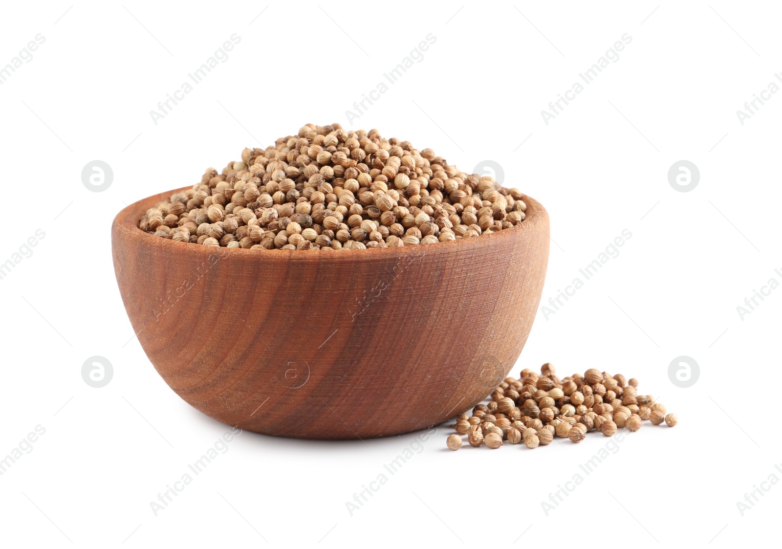 Photo of Dried coriander seeds in wooden bowl on white background