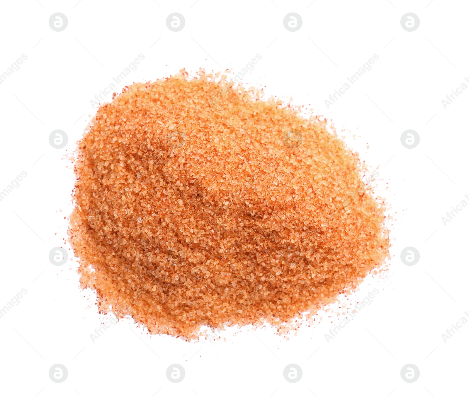 Photo of Heap of orange salt on white background, top view