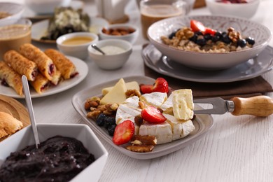 Photo of Many different dishes served on buffet table for brunch