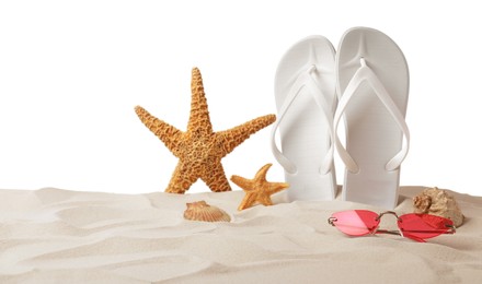 Photo of Bright flip flops, starfishes, sea shells and sunglasses on sand against white background