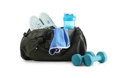 Photo of Sports bag with gym stuff and equipment isolated on white