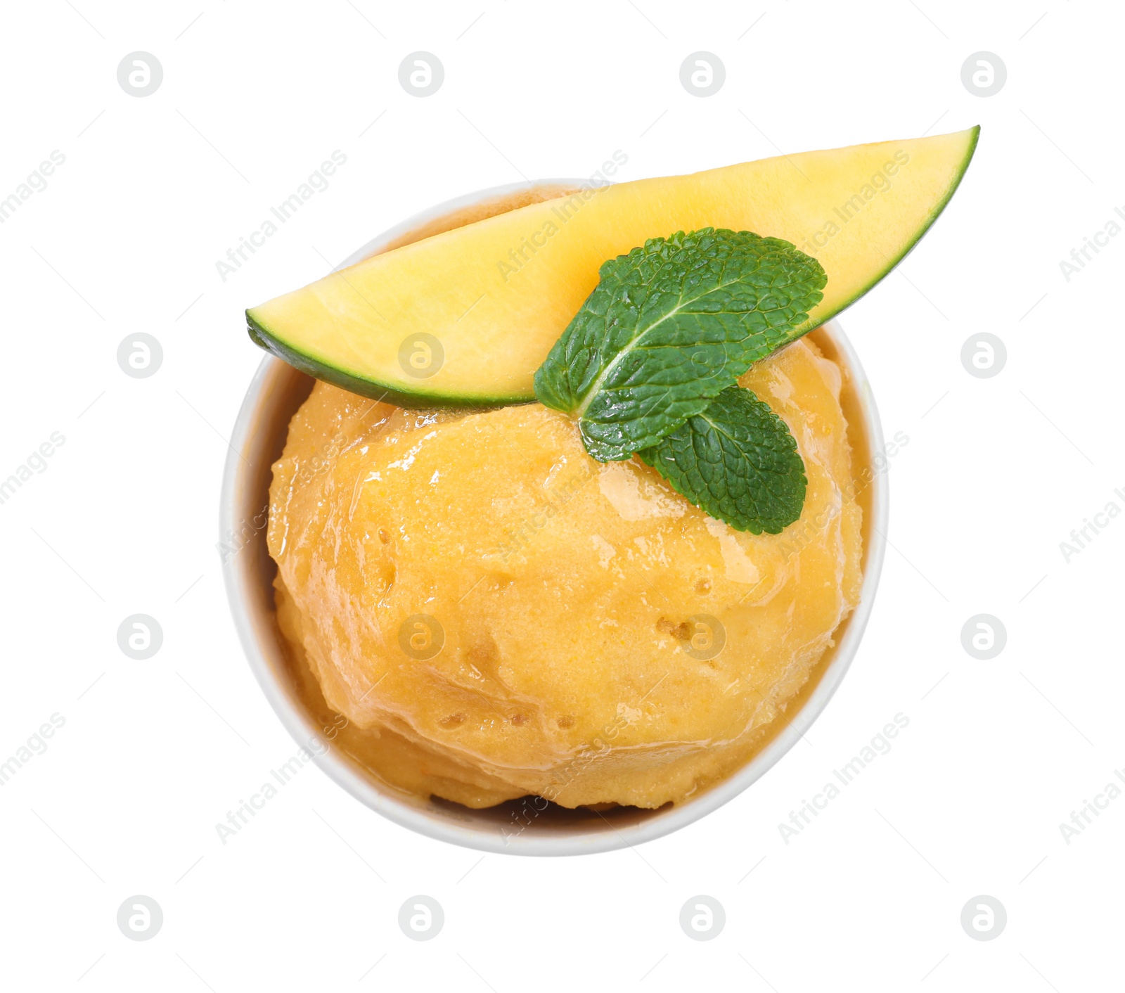 Photo of Delicious yellow ice cream with mint and mango in paper cup isolated on white, top view