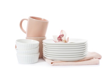 Set of clean tableware on white background. Washing dishes