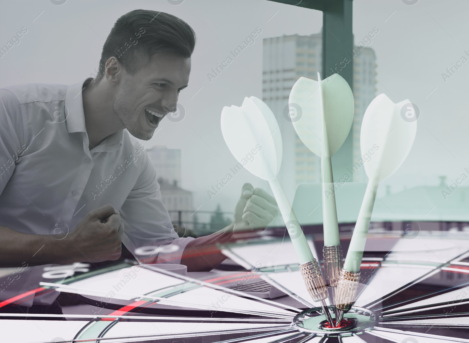 Image of Businessman working with laptop in cafe and dart board. Double exposure