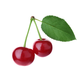 Photo of Sweet red cherries with leaf isolated on white