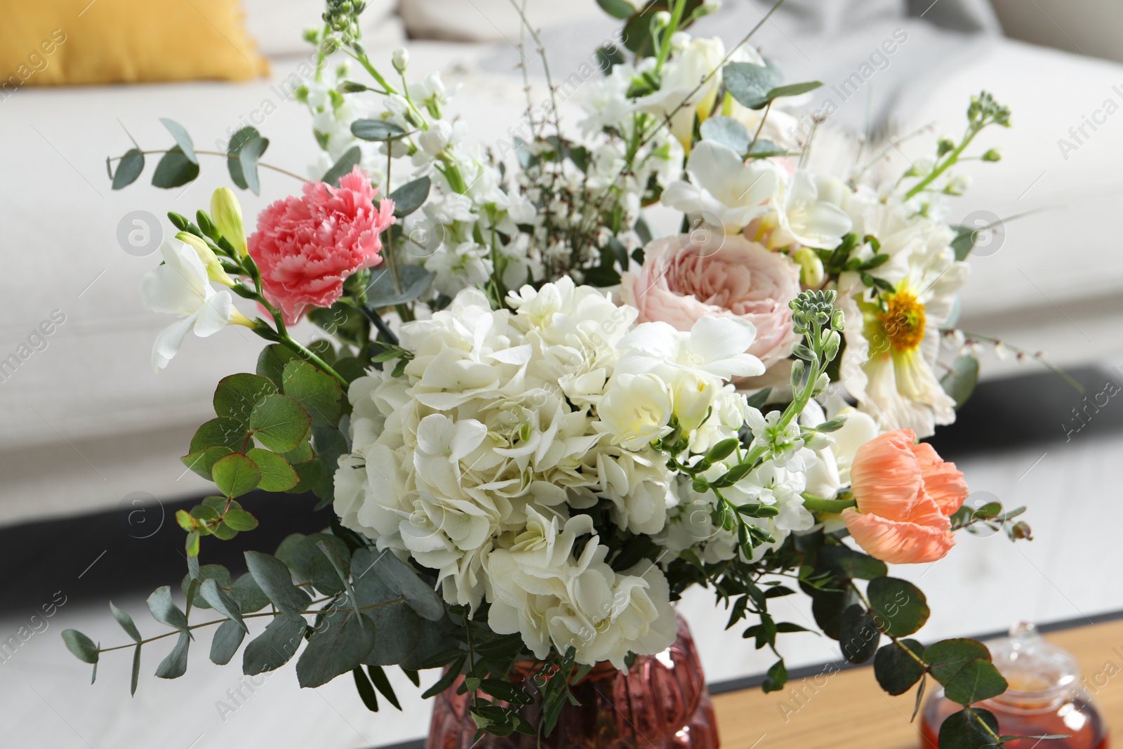 Photo of Beautiful bouquet of different fresh flowers indoors, closeup