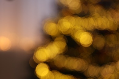 Blurred view of beautiful Christmas lights. Bokeh effect