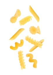 Image of Different types of pasta flying on white background