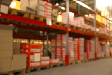 Image of Warehouse with lots of products, blurred view. Wholesale business