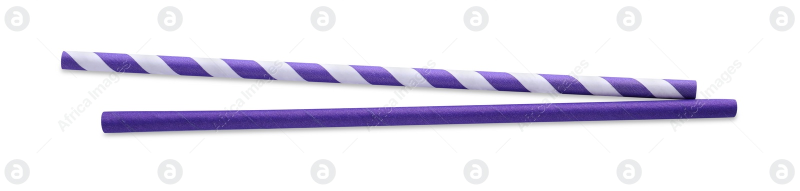 Photo of Different paper cocktail straws on white background