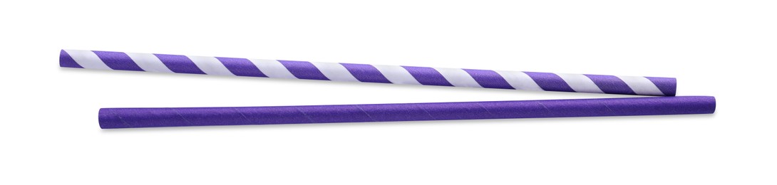 Different paper cocktail straws on white background