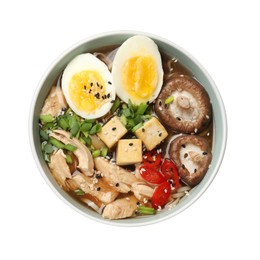 Photo of Bowl of delicious ramen isolated on white, top view. Noodle soup