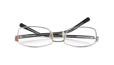 Photo of Glasses with corrective lenses on white background. Vision problem