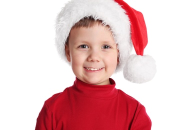 Cute child in Santa hat on white background. Christmas celebration