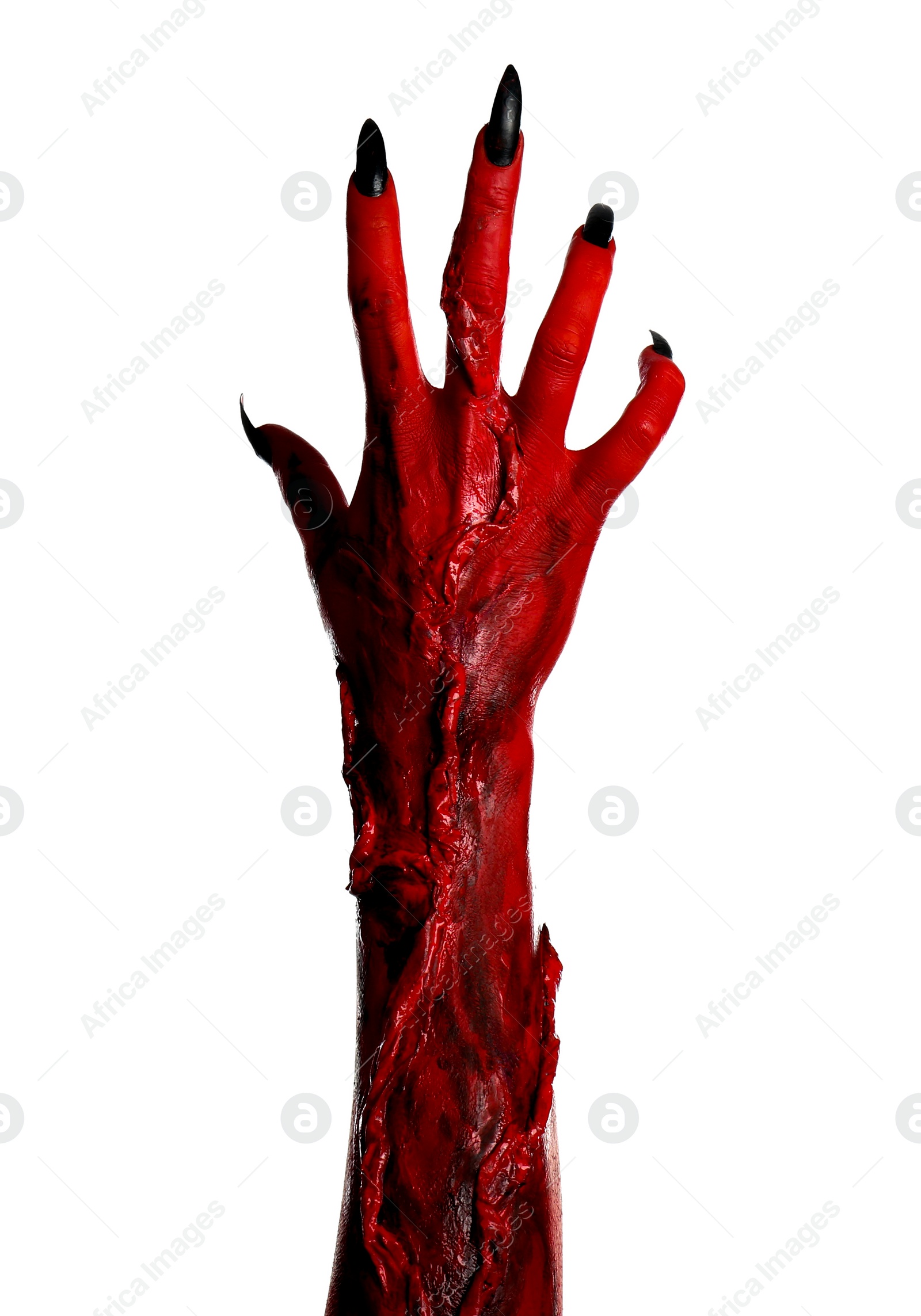 Photo of Scary monster on white background, closeup of hand. Halloween character