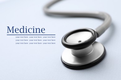 Stethoscope on light background, closeup. Space for text