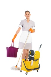 Photo of Young chambermaid with cleaning supplies on white background