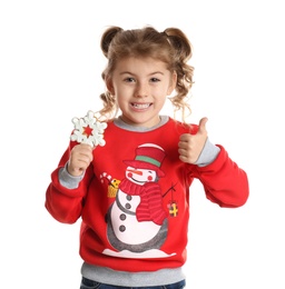 Photo of Cute little girl with Christmas gingerbread cookie on white background