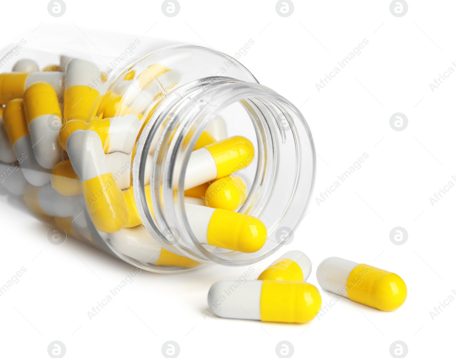 Photo of Bottle with vitamin pills isolated on white, closeup
