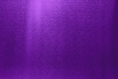 Beautiful purple foil as background, top view