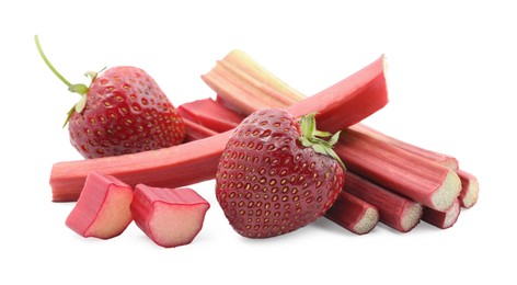 Photo of Cut rhubarb and fresh strawberries isolated on white