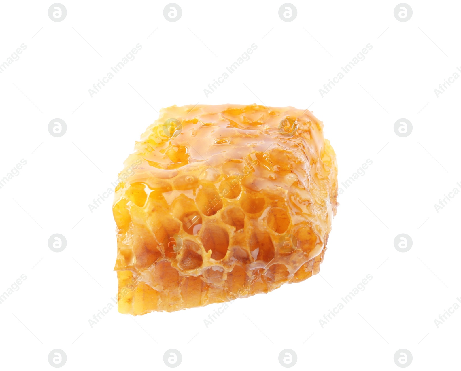 Photo of Piece of tasty fresh honeycomb isolated on white