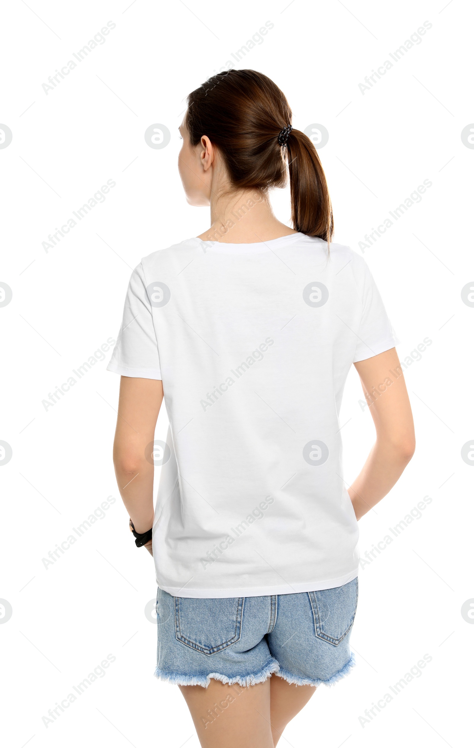 Photo of Young woman in t-shirt on white background. Mock up for design