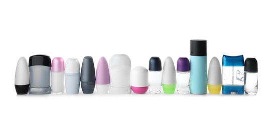 Set of different deodorants on white background