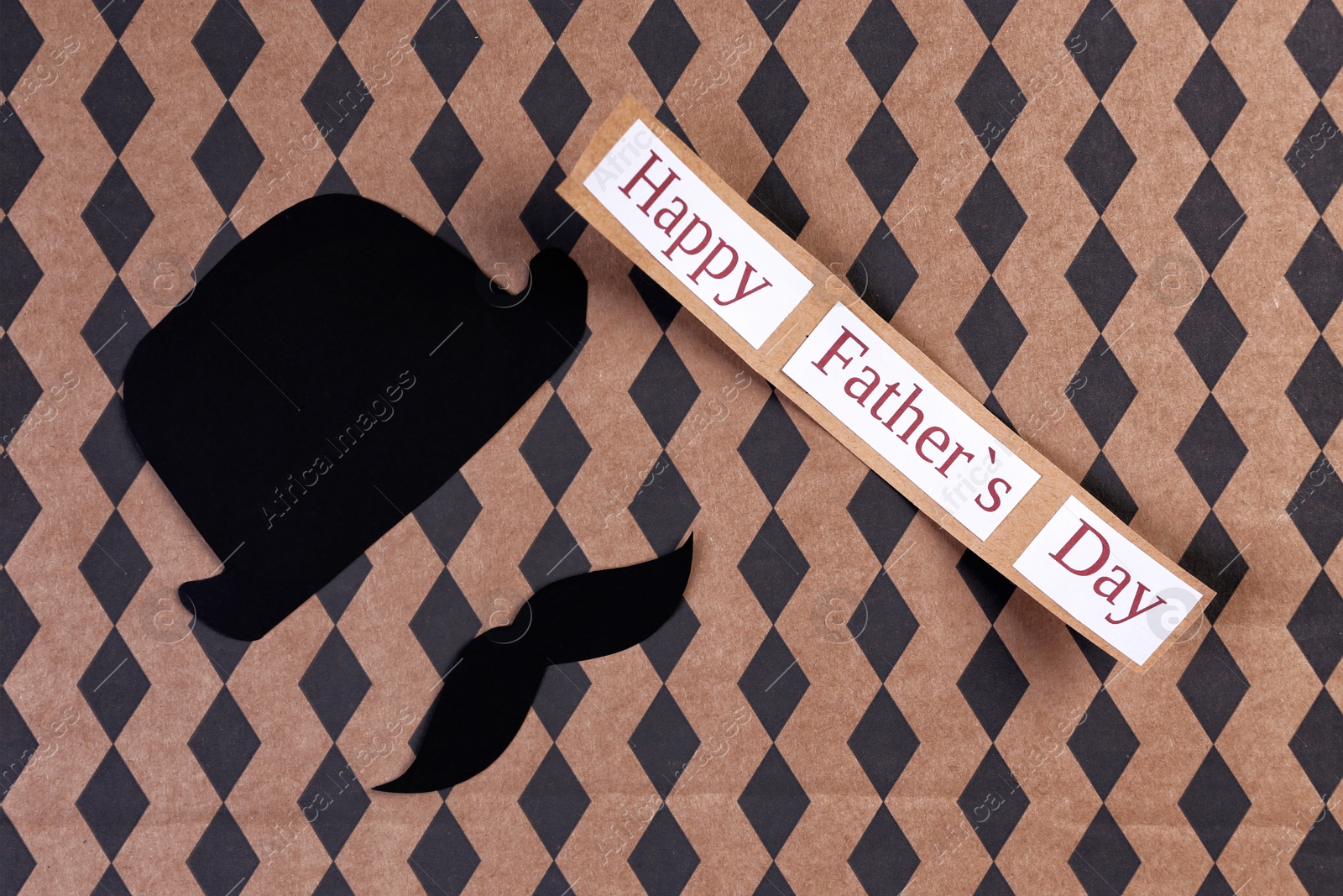 Photo of Hat and mustache on color background. Father's day celebration