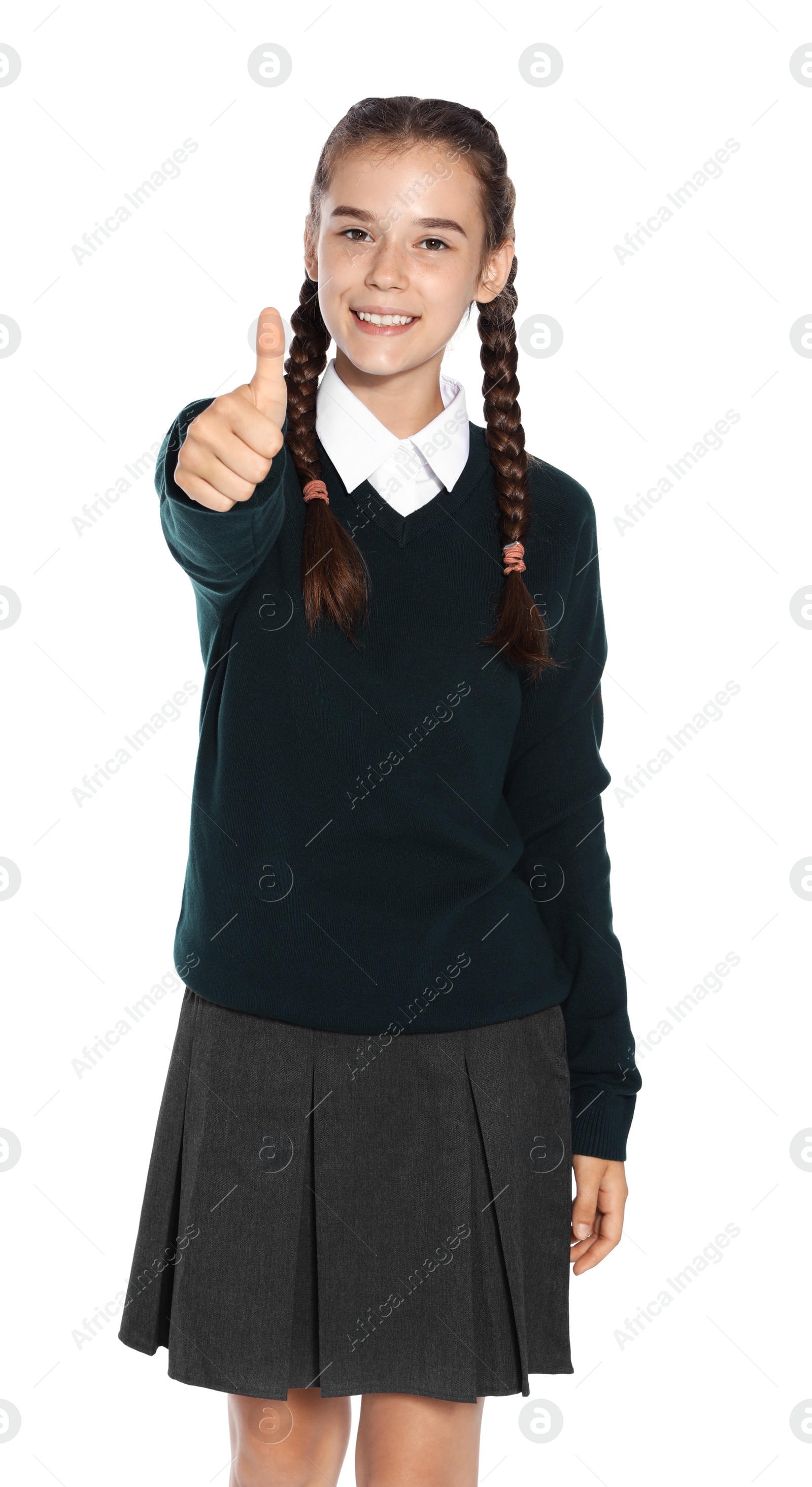 Photo of Teenage girl in stylish school uniform on white background