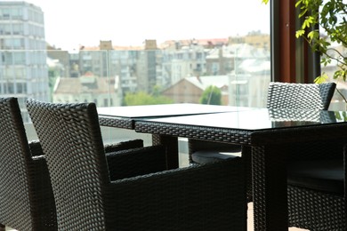 Observation area cafe. Table and chairs on terrace against beautiful cityscape