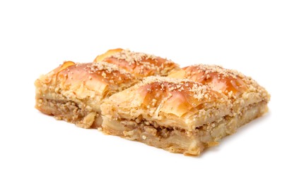 Photo of Eastern sweets. Pieces of tasty baklava isolated on white