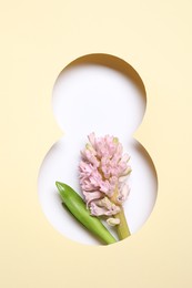 Photo of 8 March greeting card design with hyacinth, top view. Happy International Women's Day