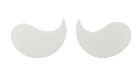 Under eye patches on white background, top view. Cosmetic product