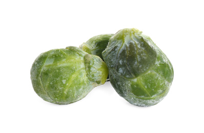 Frozen Brussels sprouts isolated on white. Vegetable preservation