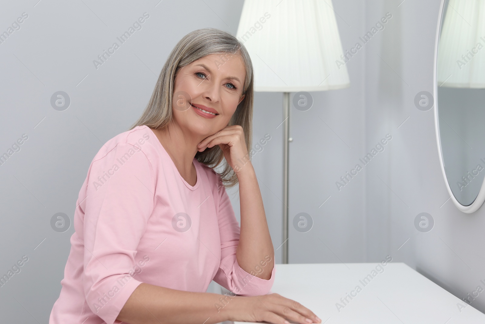 Photo of Portrait of beautiful senior woman at home. Space for text