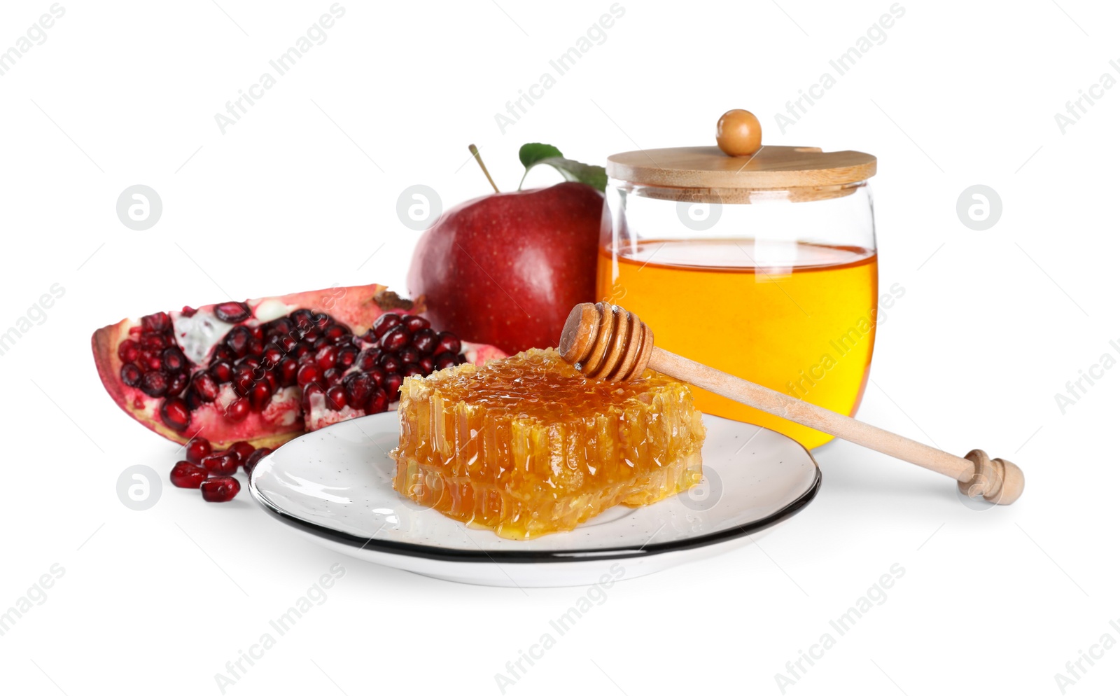 Photo of Honey, apple and pomegranate seeds on white background. Rosh Hashanah holiday